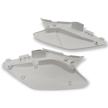 w23207 Coppia fianchetti sotto sella posteriori HM - Vent in plastica di colore bianco senza grafiche per HM e Vent 50 cc e 125 cc enduro e motard